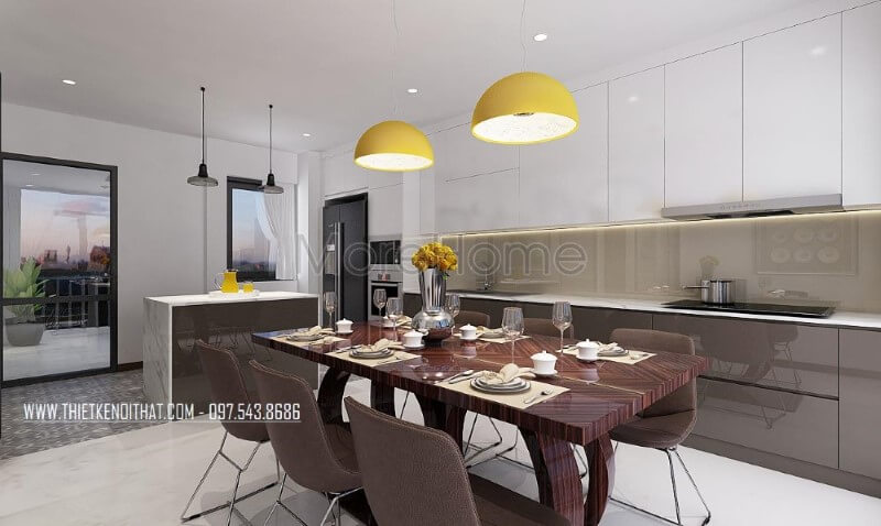 Bộ bàn ghế phòng ăn gỗ nguyên tấm sẫm 6 ghế màu kết hợp cùng tone sáng từ tủ bếp tạo nên vẻ đẹp hài hòa, sang trọng cho phòng bếp hiện đại. Thiết kế nội thất